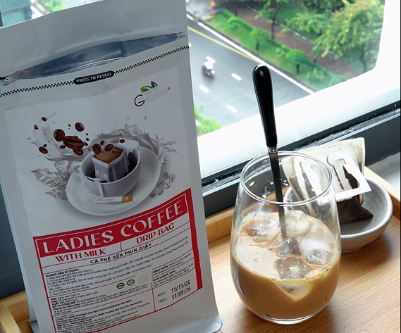 Ladies Coffee Goce – Chill With A Cup Of Milk Coffee On A Rainy Day.